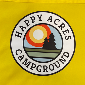 tote bag yellow with happy acres logo on the front