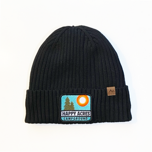 black knit lined beanie hat with happy acres patch