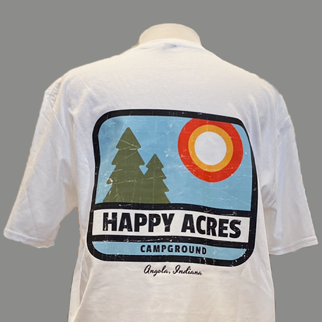 white tshirt with happy acres logo on the back